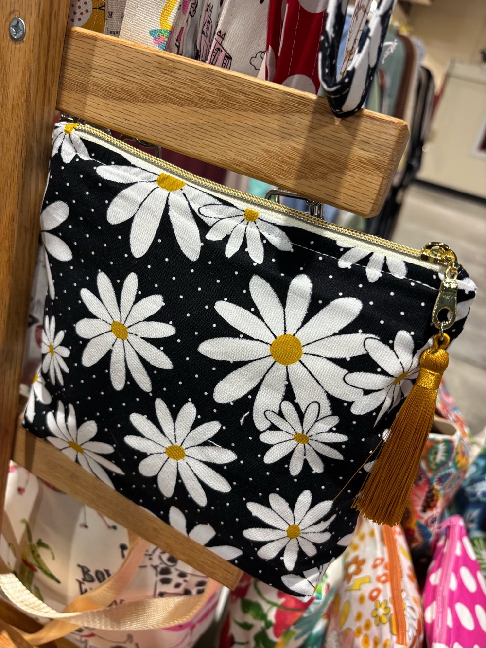 Black Daisy Print Cosmetic Bag with Gold Tassel